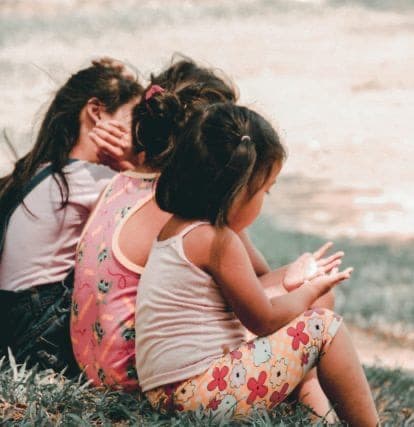 Toddlers playing outdoors at Brown Bear Day Care